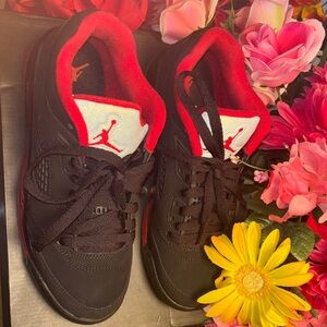 Jordan Black and Red Low-Top Sneakers. Women’s size 7, Boys 5.5